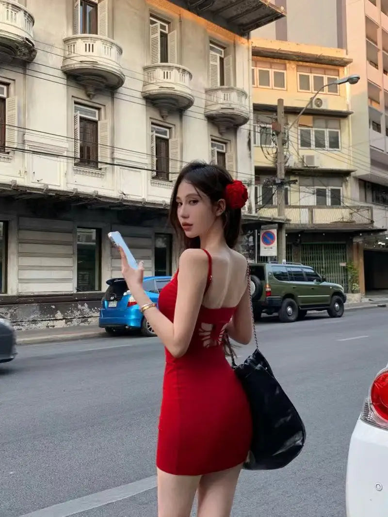 Pure wind red bow hollowed out beautiful back design halter dress female summer sexy slim-fit package hip skirt