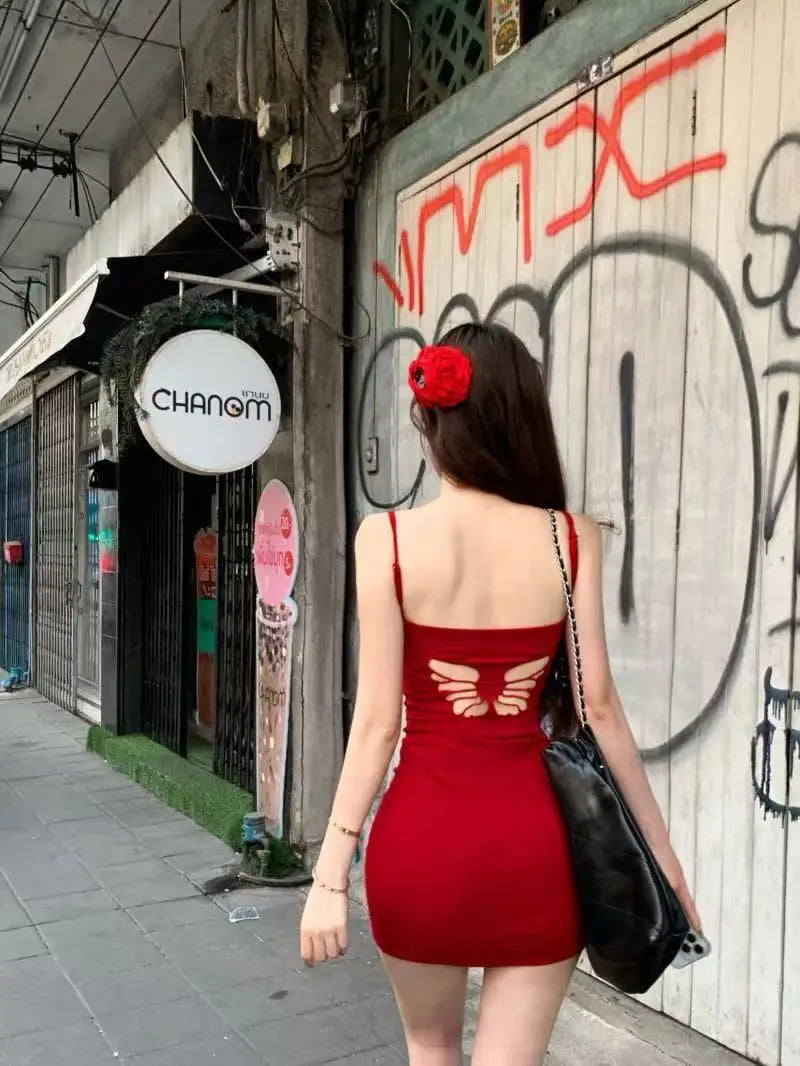 Pure wind red bow hollowed out beautiful back design halter dress female summer sexy slim-fit package hip skirt
