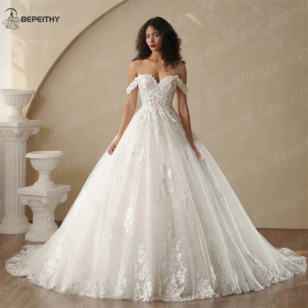 BEPEITHY Customized Strapless A Line Off Shoulder Long Sleeves Bride Ivory Wedding Dresses Glitter Court Train Bridal Gown 2025 Badiee Stylez