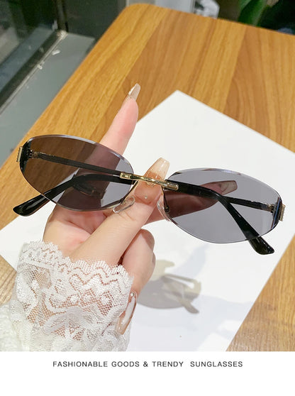 Retro Frameless Oval Concave Design Y2k Personalized Sunglasses Trendy Uv Resistant Street Photography Sunglasses 90275