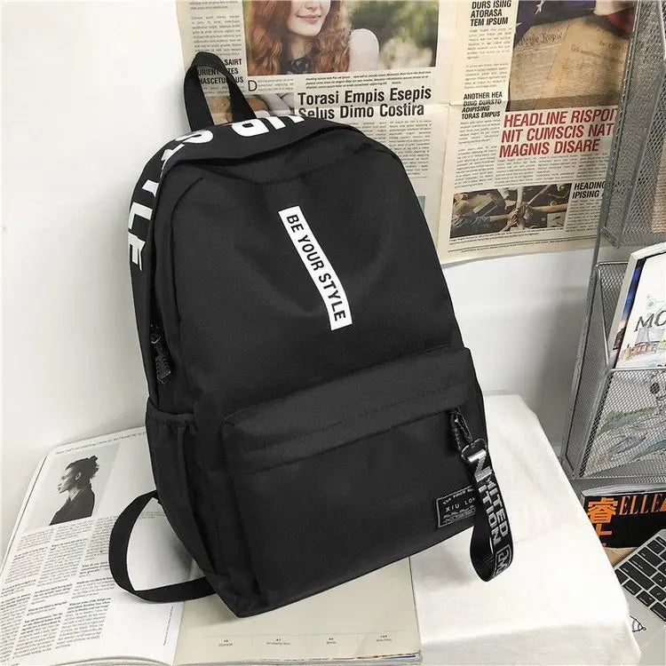 Fashion trend backpack backpack for men and women junior high school high school student bag large capacity korean version of th Black and white