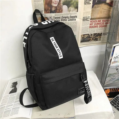 Fashion trend backpack backpack for men and women junior high school high school student bag large capacity korean version of th Black and white