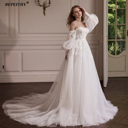 BEPEITHY Customized Strapless A Line Off Shoulder Long Sleeves Bride Ivory Wedding Dresses Glitter Court Train Bridal Gown 2025 Badiee Stylez