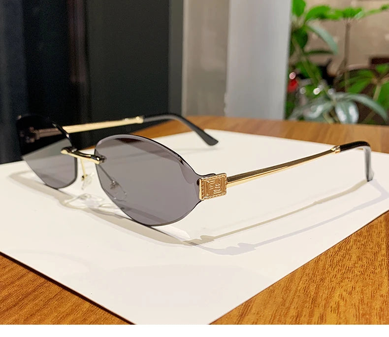 Retro Frameless Oval Concave Design Y2k Personalized Sunglasses Trendy Uv Resistant Street Photography Sunglasses 90275