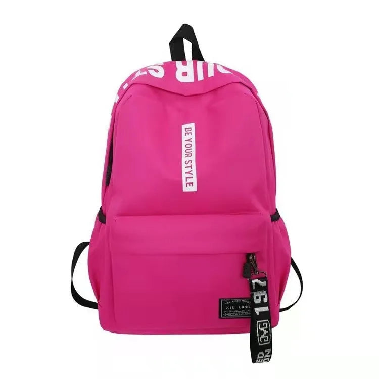 Fashion trend backpack backpack for men and women junior high school high school student bag large capacity korean version of th Rose red