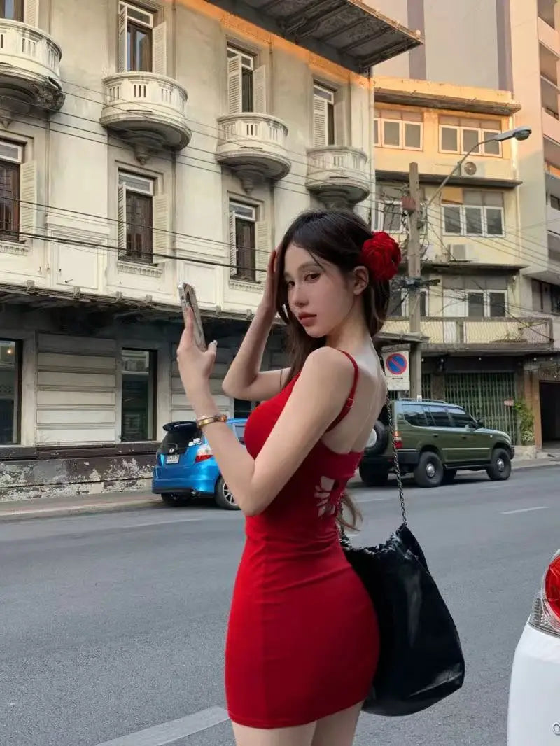 Pure wind red bow hollowed out beautiful back design halter dress female summer sexy slim-fit package hip skirt