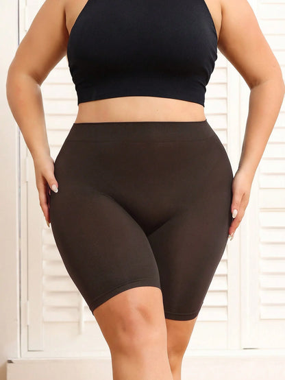 Plus-size women's shorts with tummy control and butt-lifting features to prevent exposure and provide safety shorts. Coffee