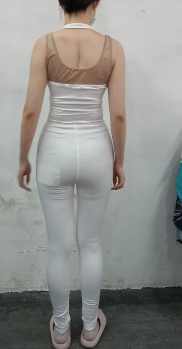 Women's jumpsuit 2025 summer new sleeveless new fashionable hollow camisole buckle comparison mesh tight jumpsuit Badiee Stylez