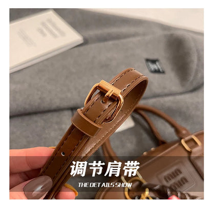 Luxury high-end designer portable bowling bag female 2025 new autumn and winter fashion all-match messenger bag small square bag