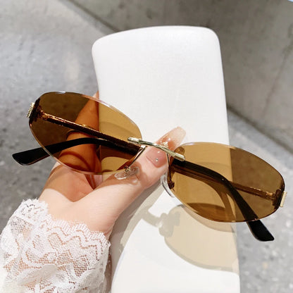 Retro Frameless Oval Concave Design Y2k Personalized Sunglasses Trendy Uv Resistant Street Photography Sunglasses 90275 Brown