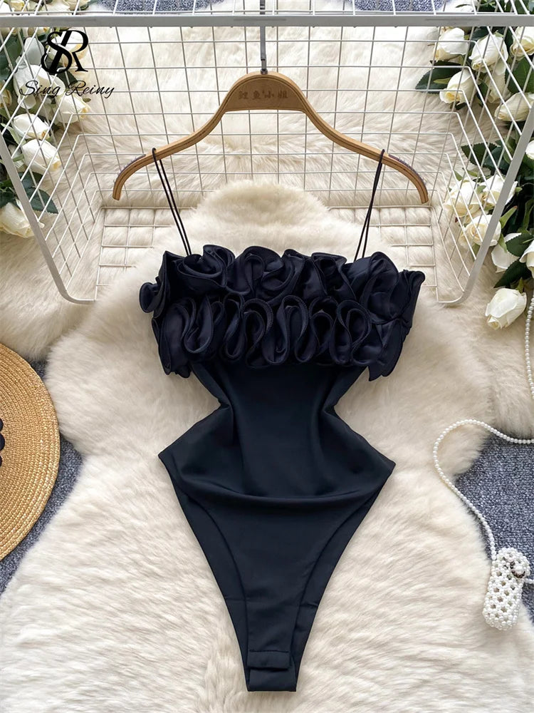 SINGREINY Summer Streetwear Sheath Open crotch Bodysuits Sleeveless Backless Short Rompers Women Solid 3D Flowers Sexy Playsuits black One Size