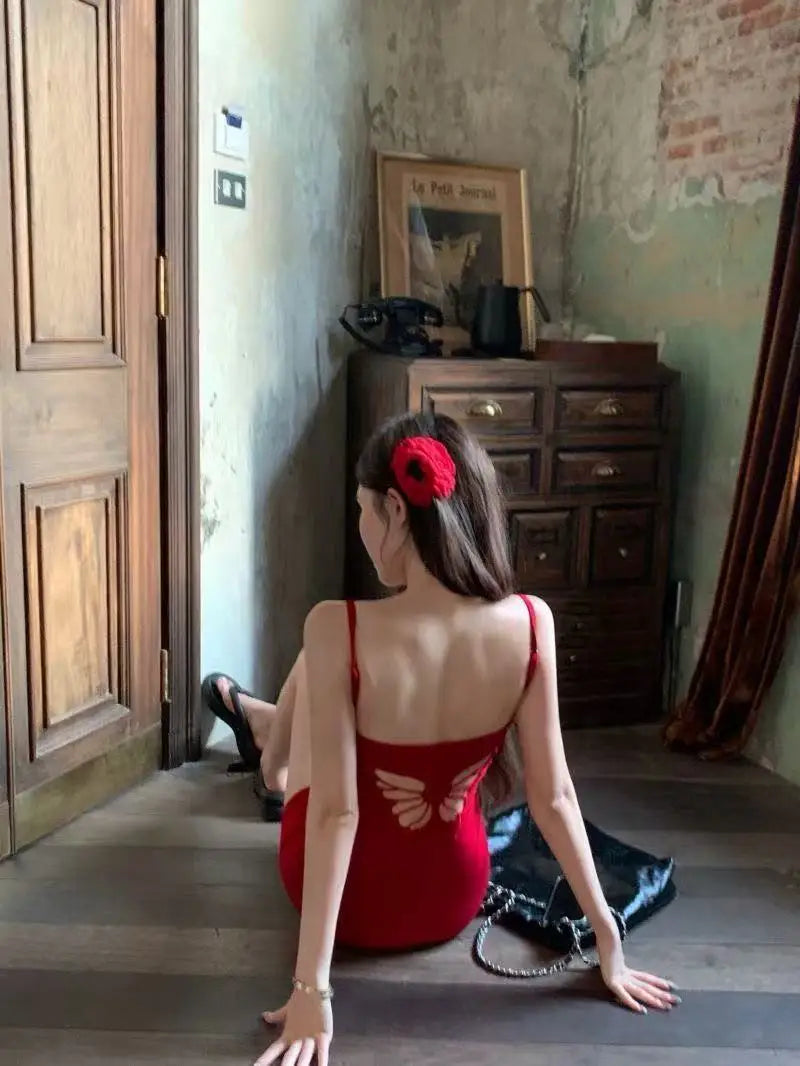 Pure wind red bow hollowed out beautiful back design halter dress female summer sexy slim-fit package hip skirt