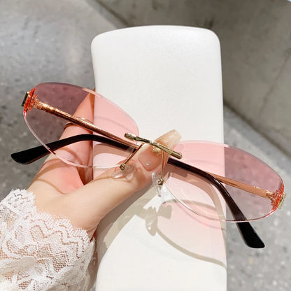 Retro Frameless Oval Concave Design Y2k Personalized Sunglasses Trendy Uv Resistant Street Photography Sunglasses 90275 Pink