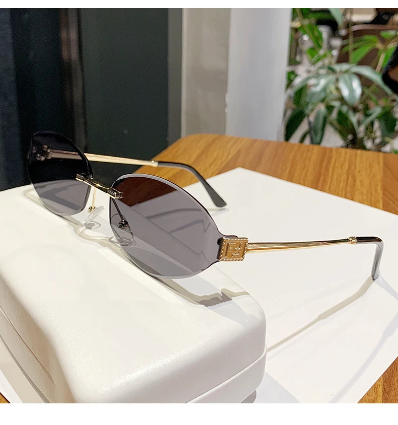 Retro Frameless Oval Concave Design Y2k Personalized Sunglasses Trendy Uv Resistant Street Photography Sunglasses 90275