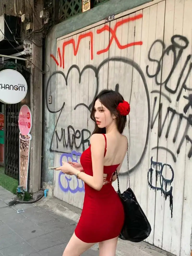 Pure wind red bow hollowed out beautiful back design halter dress female summer sexy slim-fit package hip skirt