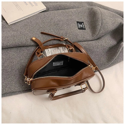 Luxury high-end designer portable bowling bag female 2025 new autumn and winter fashion all-match messenger bag small square bag