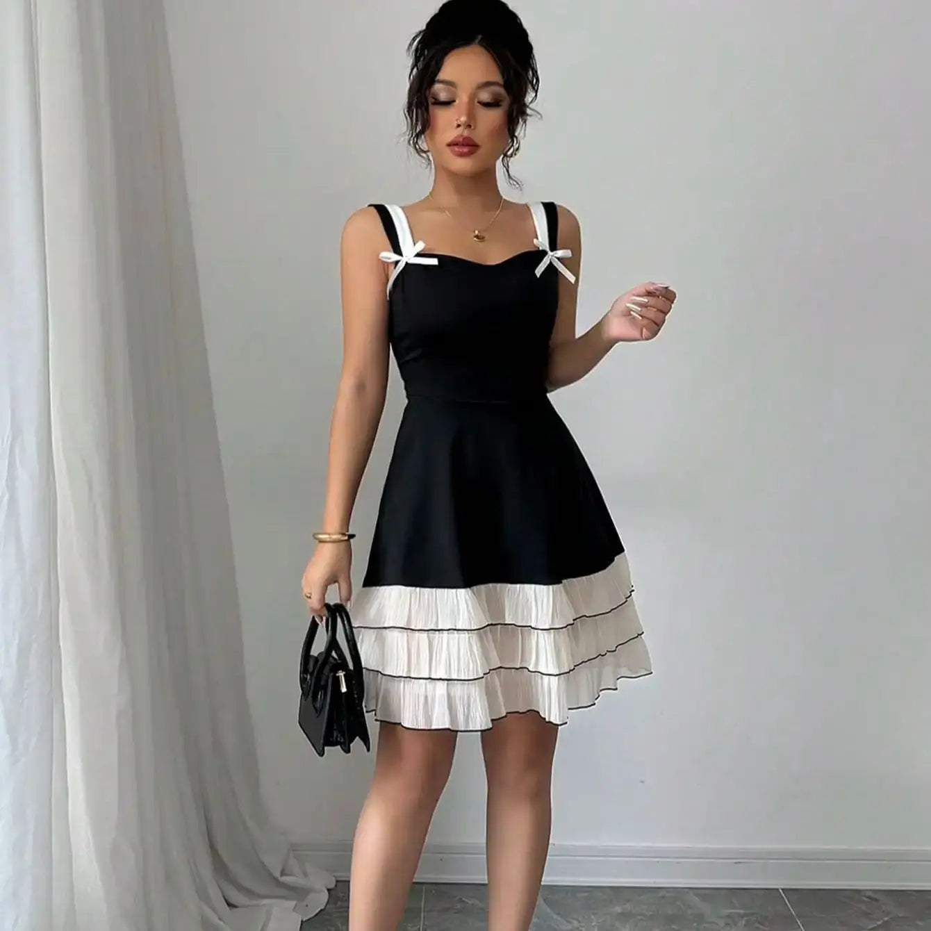 Women's mini suspender waist cinching cake tail dress Badiee Stylez