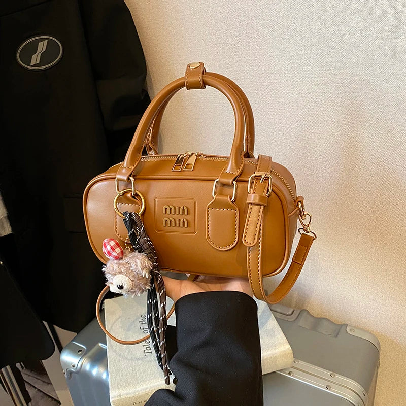 Luxury high-end designer portable bowling bag female 2025 new autumn and winter fashion all-match messenger bag small square bag Yellow brown CHINA